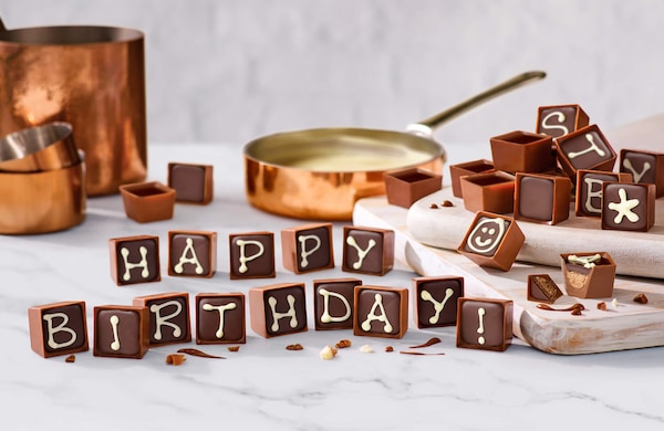 https://www.thorntons.com/medias/sys_master/images/h6c/hc0/11238523535390/2223-alphatruffles-birthdaypans-land-small-2x/2223-alphatruffles-birthdaypans-land-small-2x.jpg?resize=xs-s-s