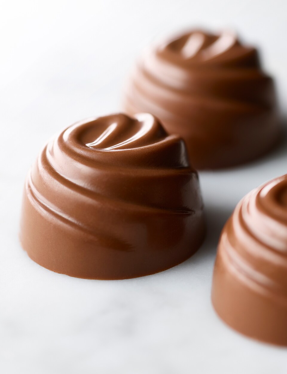 a moulded smooth milk chocolate swirl