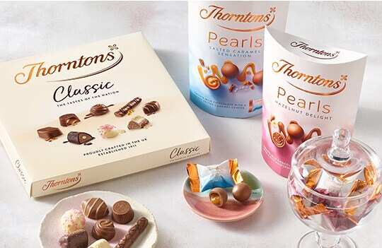 https://www.thorntons.com/medias/sys_master/root/h13/hc4/9036939919390/2022-classic-pearls-land-small-0.5x/2022-classic-pearls-land-small-0.5x.jpg?resize=FerreroCardsCarouselComponent