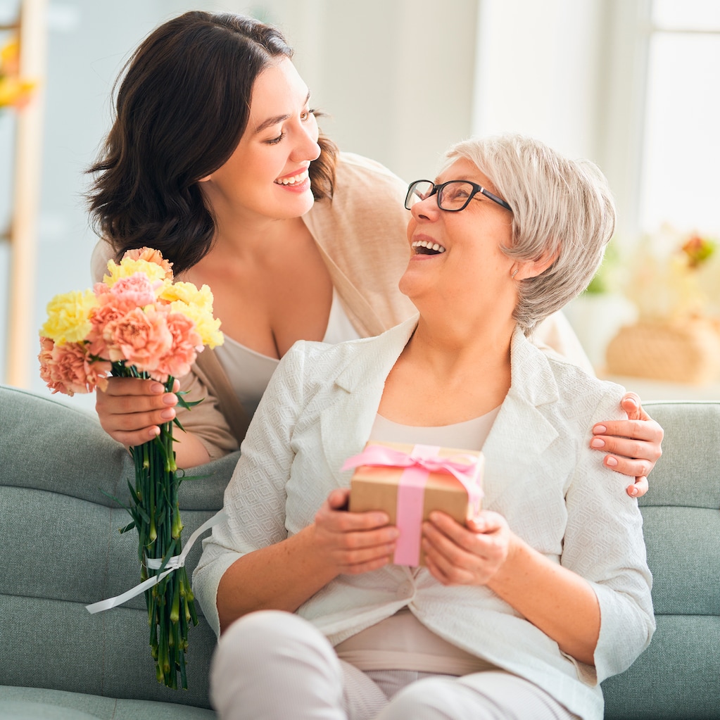 Daughter giving mum present