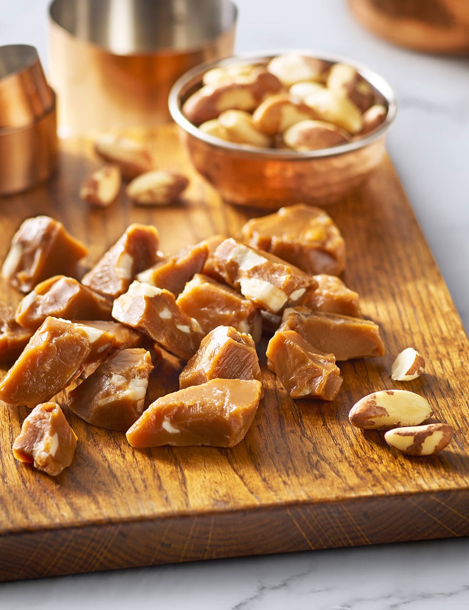 Chopped brazil nut toffee on board