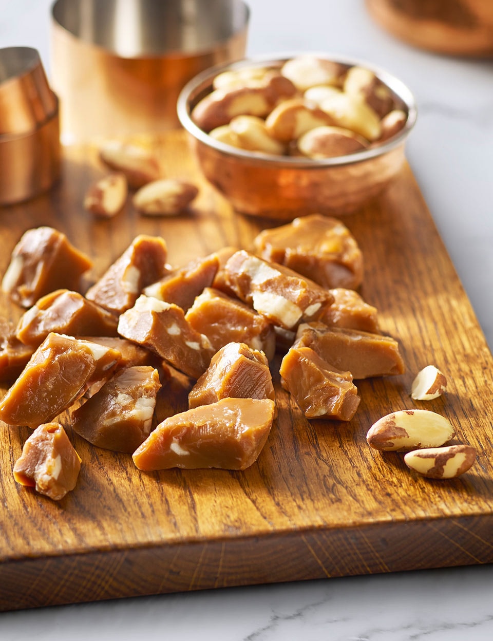 Chopped brazil nut toffee on board
