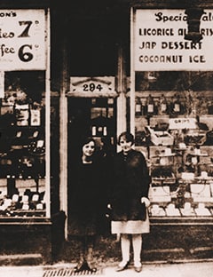 People standing outside of the Thorntons shop in Sheffield 1911.