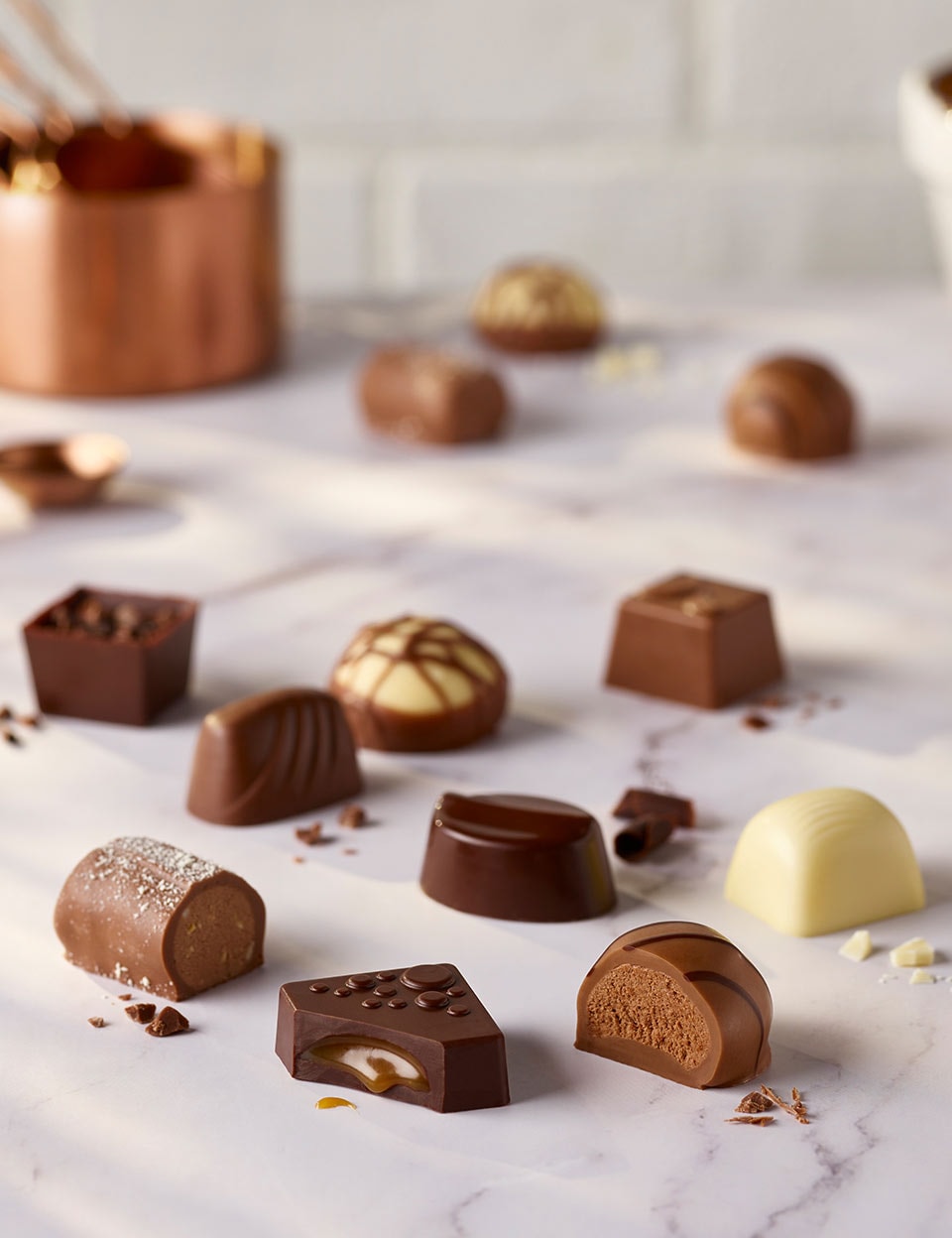 Continental chocolates on a marble surface.