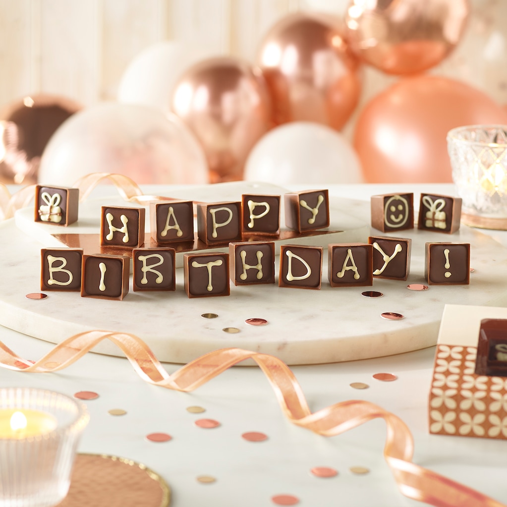 Thorntons Alphabet Truffles with Happy Birthday hand iced.